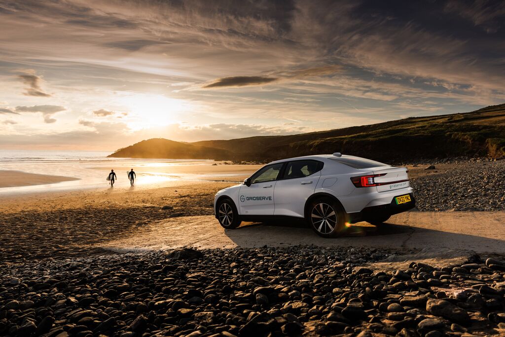 Polestar car by a beach at sunset