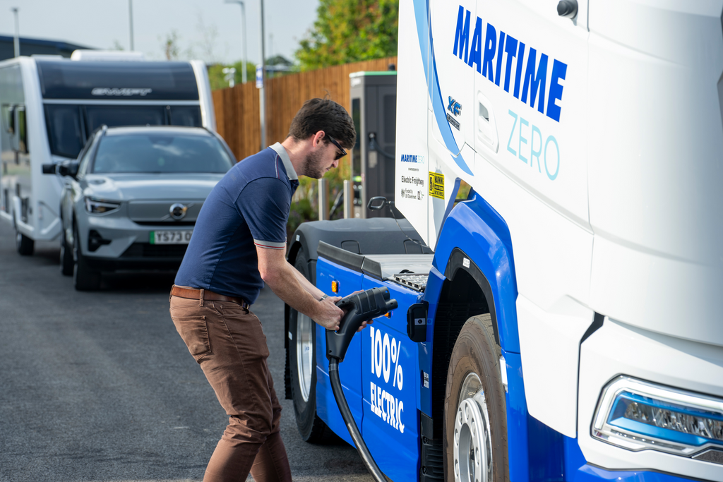 An eHGV being plugged in to charge at GRIDSERVE Markham Vale Electric Forecourt